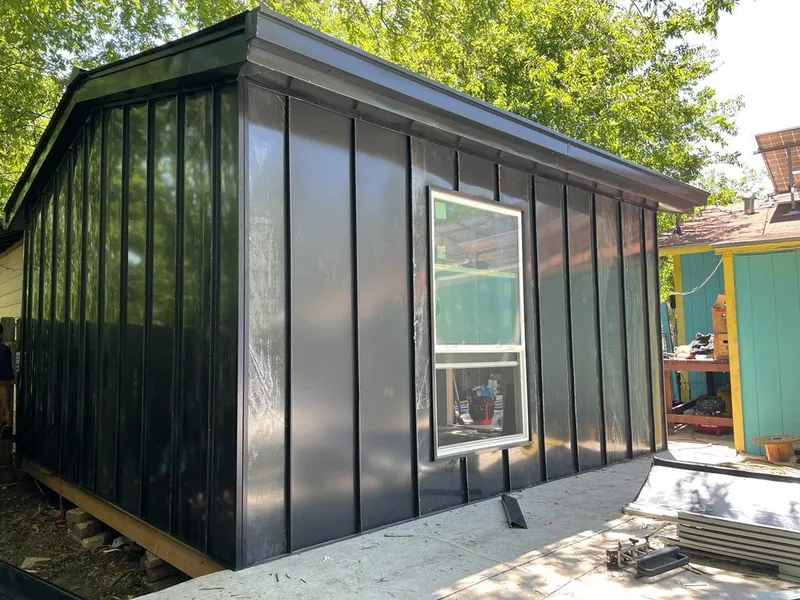 Black standing seam metal wall panels for Metal Roof Installation in Firebaugh